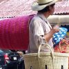 person with baskets at a Mexico altura market