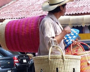 person with baskets at a Mexico altura market