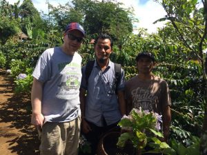 Jon Burman and two Indonesian Bali Blue Moon coffee estate workers
