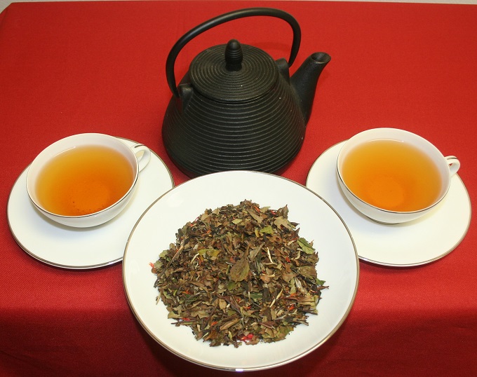 teapot, teacups, and loose leaf Pai Mu Tan white tea