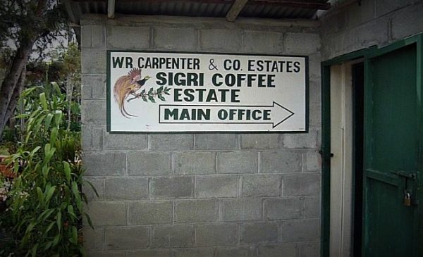 Sign pointing to the Sigri Coffee Estate main office in Papua New Guinea