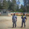 Security guards at Sigri Estate with bows and arrows in Papua New Guinea