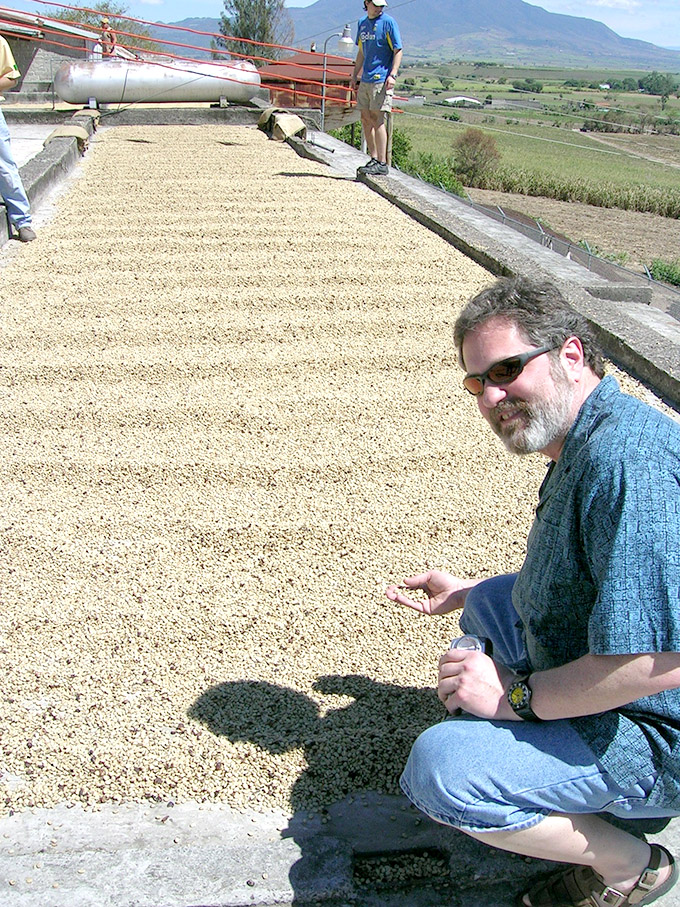coffee beans drying, people