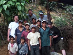 Vista Hermosa workers and family posing outside in Guatemala