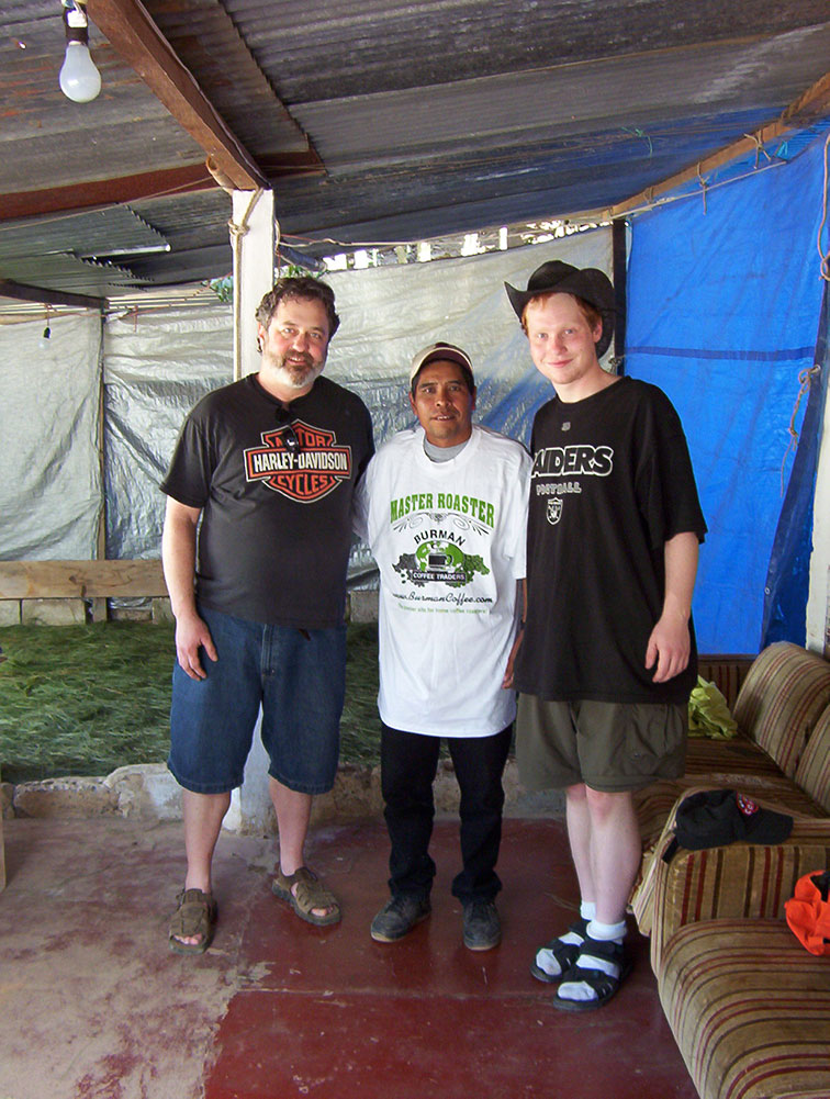 Jon and Garry Burman with the farm manager at Finca Vista in Guatemala