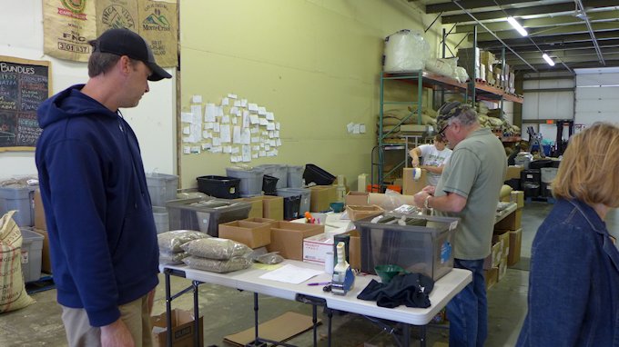 Workers packing orders at Burman Coffee Traders