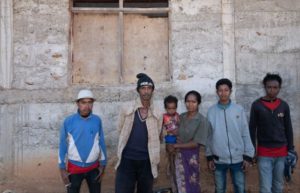 Workers standing in front of a wall in Timor-Leste