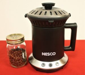 Nesco Roaster and a jar of coffee beans