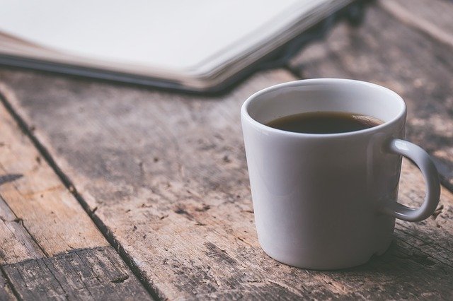 Journal and cup of coffee