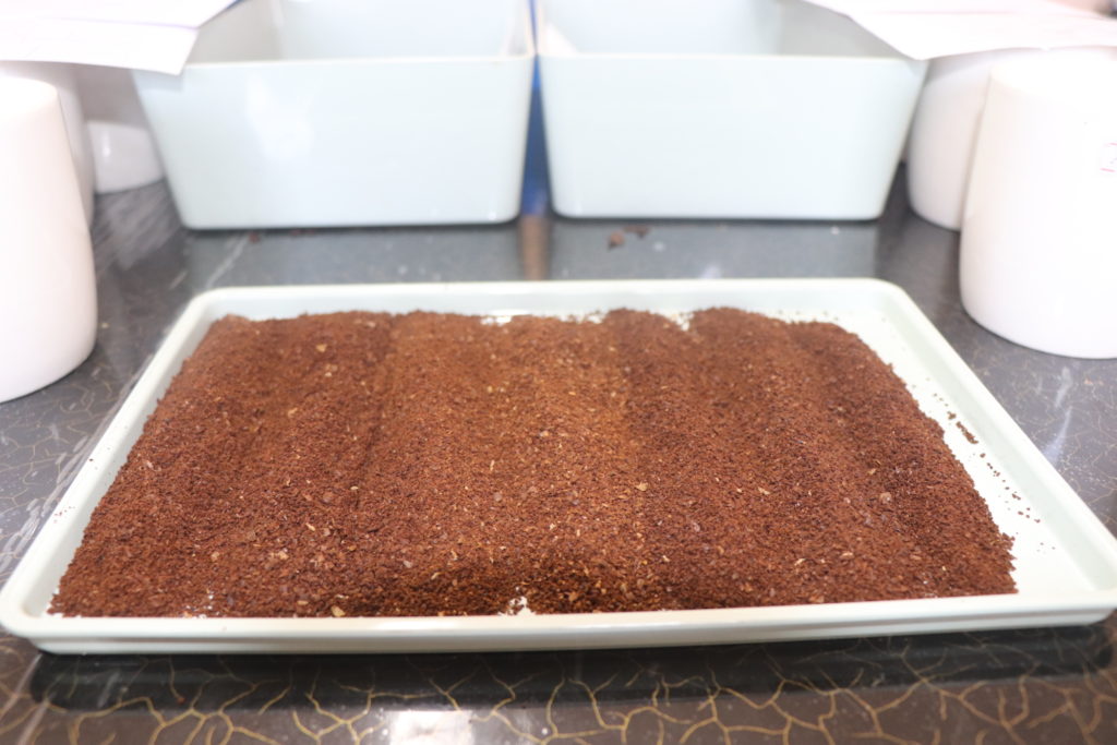 Plate of ground Asikana coffee