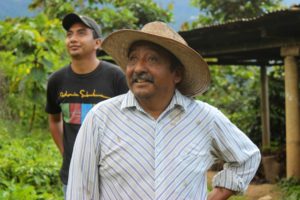 Two men outside at a coffee farm el rancho Guatamala