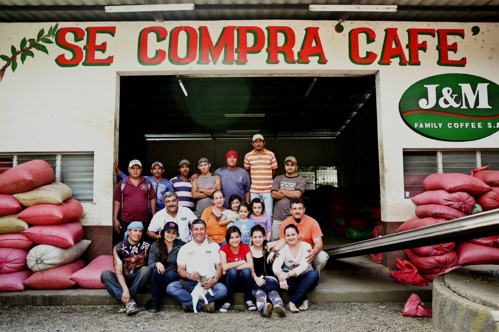 Photo of workers and family at J and M Coffee in Nicaragua